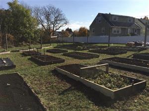 Schultheis Farm - Garden beds repaired and new soil added.