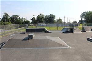 Photo of the Xtreme Scene at the Clifton Skatezone Showing a Small Half Pipe and Other Equipment.